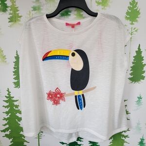 Catherine Melandrino Tucan Tee.